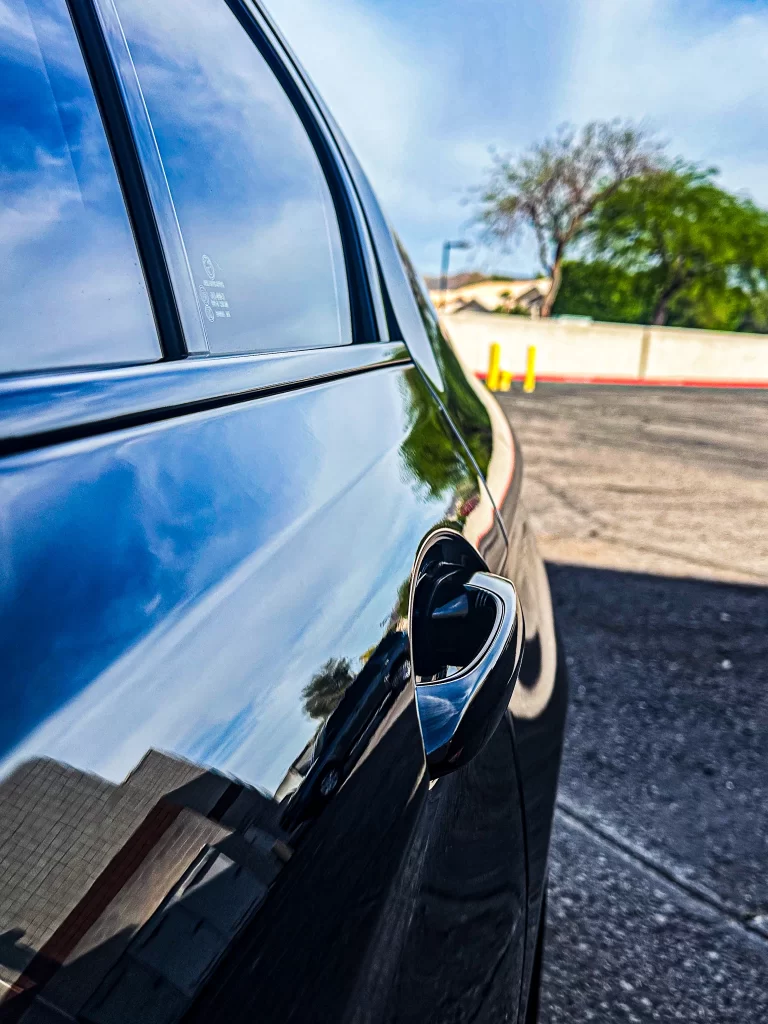 BMW dent completely repaired with paintless dent repair in Phoenix Arizona by Patriot Dent Repair