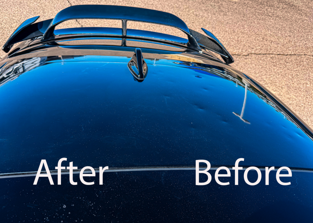 Close-up showing partial paintless dent repair on the roof of a 2023 Kia Stinger. Half the roof still covered in hailstorm damage, the repaired section demonstrates complete dent removal while preserving the original paint.